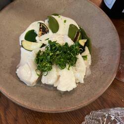Fish with basil oil and fresh herbs