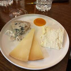 Peach puree, goat blue cheese, hard cow/sheep cheese, cow Brie