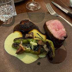 Pork with roasted peppers and bacon. Chorizo sausage