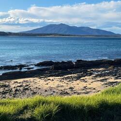 Looking across Horseshoe Bay at Bermagui to Gulaga/Mount Dromedary