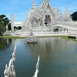White reflects purity of the Buddha