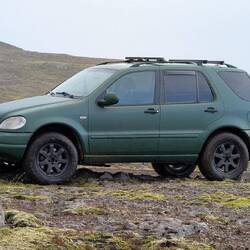 Still in travel mode, spare gas tanks, shovel, board still in the car so it fits into the ferry