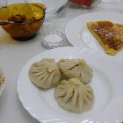 Steamed dumplings with plenty of other good tucker.
