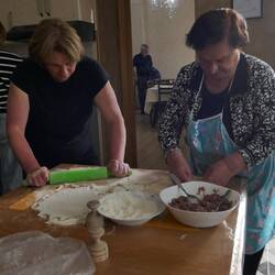Mother and daughter whipping up our lunch.
