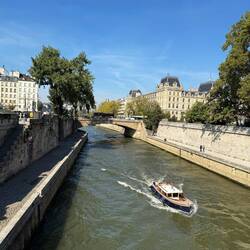 River Seine, Île de la Cité on the right. The boat has a bride and groom on board