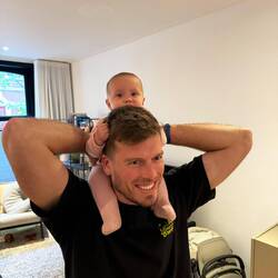 Riding on her uncles shoulders