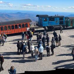 Passengers waiting to board the cog railway and decend