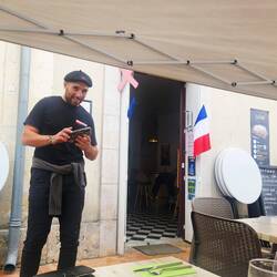 Our friendly French waiter