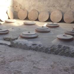 Room containing giant dolia buried in ground to store wine