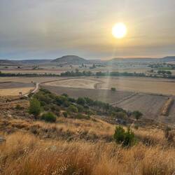Looking back at the sunrise over Castrojeriz.