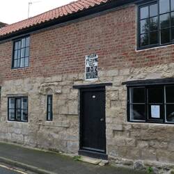 17th century fisherman's cottages, the oldest building in town