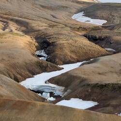 Looks like a broken river, it was a miniature glacier. But as most, receding