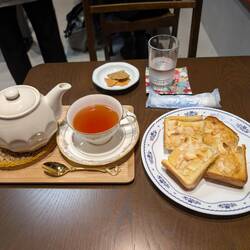 Tea and toast laid out with care