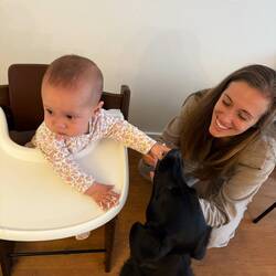 Maya helping clean Billie off after trying rice