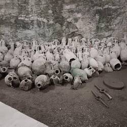 Amphora display in the gallery beneath the floor of the coliseum