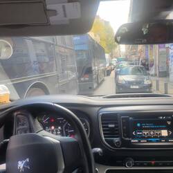 Those are bus loads of riot police. Our driver backed up and did a u turn in front of them.