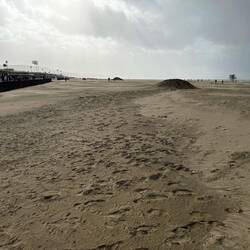 Beach again. Blowing a gale, storm coming on the right