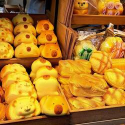 Little breads some of which are shaped into adorable figures.