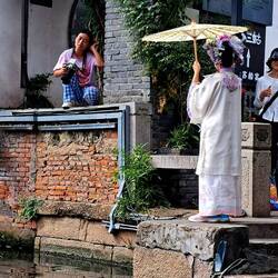 One of countless examples of a traditionally-outfitted girl having her picture taken.