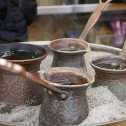 Armenian coffee brewing in hot sand