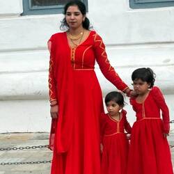 Father asking his girls to pose for a special picture