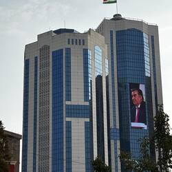 The president's photo is plastered on buildings all over town