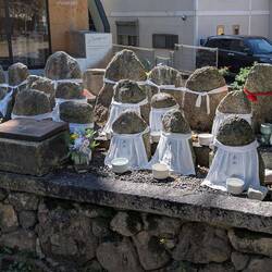 Ancestral spirits beside the canal. Each has their name. Temporary resting place for war dead