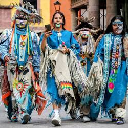 Locals dressed in festive costumes.