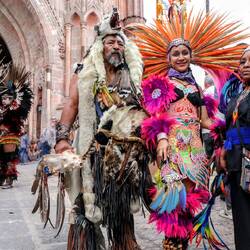 Locals dressed in festive costumes.