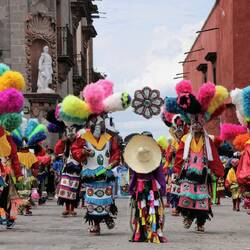 Locals dressed in festive costumes.