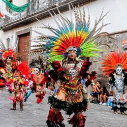 Locals dressed in festive costumes.