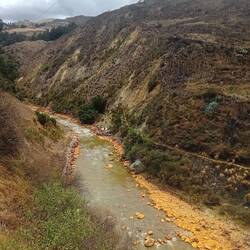 We first follow the Santa river uphill, with striking orange deposits from a tributary.