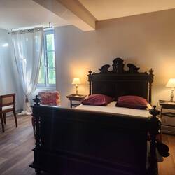 Beautiful old bed in our gite