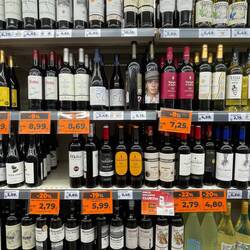 Shopping for dinner. Some of the Spanish wine is less expensive than water!