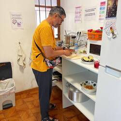 Vikram cooking vegi's for our communal dinner.