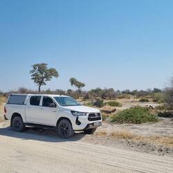 Bakkie in the bush. Somewhere along the better road outside the park.