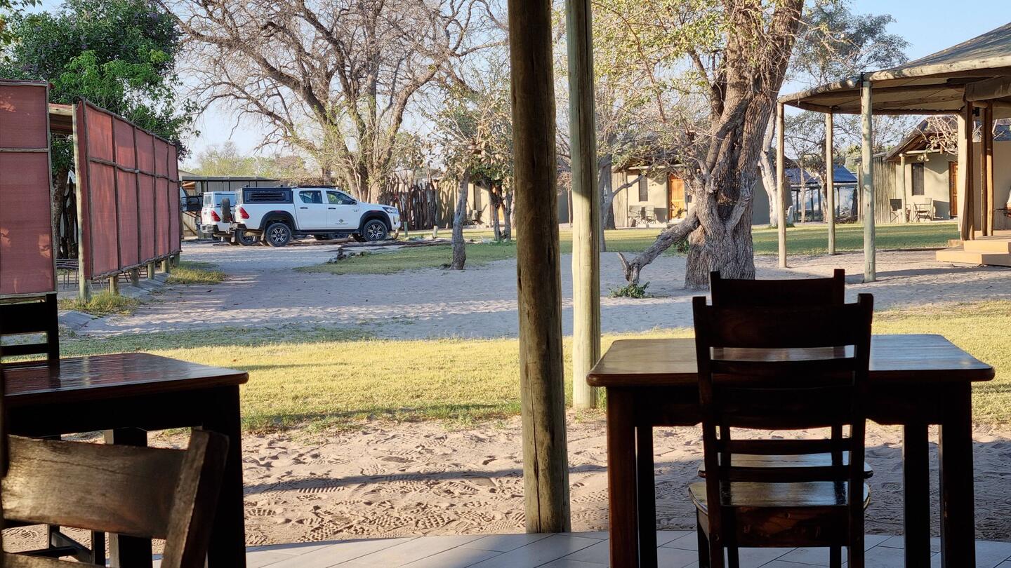 The bakkie ready to leave Khwai. We are munching toast cooked over a fire.