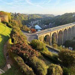 Viaduct and port of Dinon with walls on the left