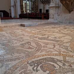Extensive floor mosaics in the cathedral. From 12th century.