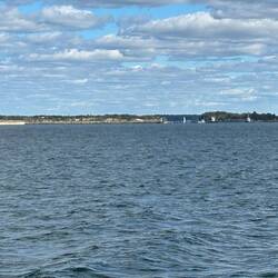 Passing across the entrance to Muskegon Lake and the town of Muskegon