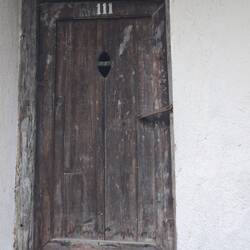 Address was not shown by numbers but by the design on the door