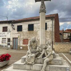 Tired pilgrims resting at the square.