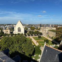 The garden, church, and town of Angers