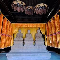 3 sitting Buddhas reflecting 3 lives: past, present & future.