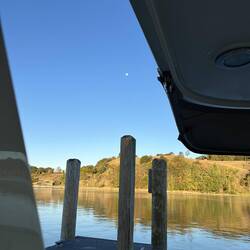 The moon is still full, but waning, as I venture out to sample the day on a glassy Grand River