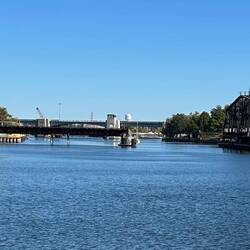 Railroad swingbridge with highway drawbridge beyond