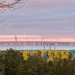 Sunset on the cliffs of Nova Scotia across the Bay of Fundy