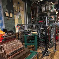 An old cash register and popcorn machine