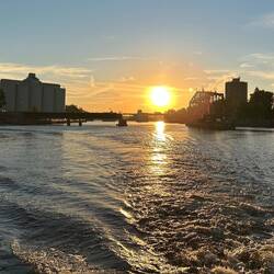 The train has passed and the bridge has swung open for river traffic