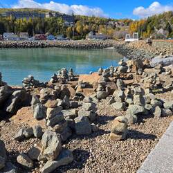 A spot at the end of the quai where people build inukshuks